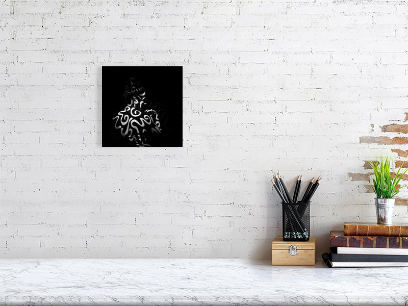 8 x 8 print tattooed by light on a brick wall