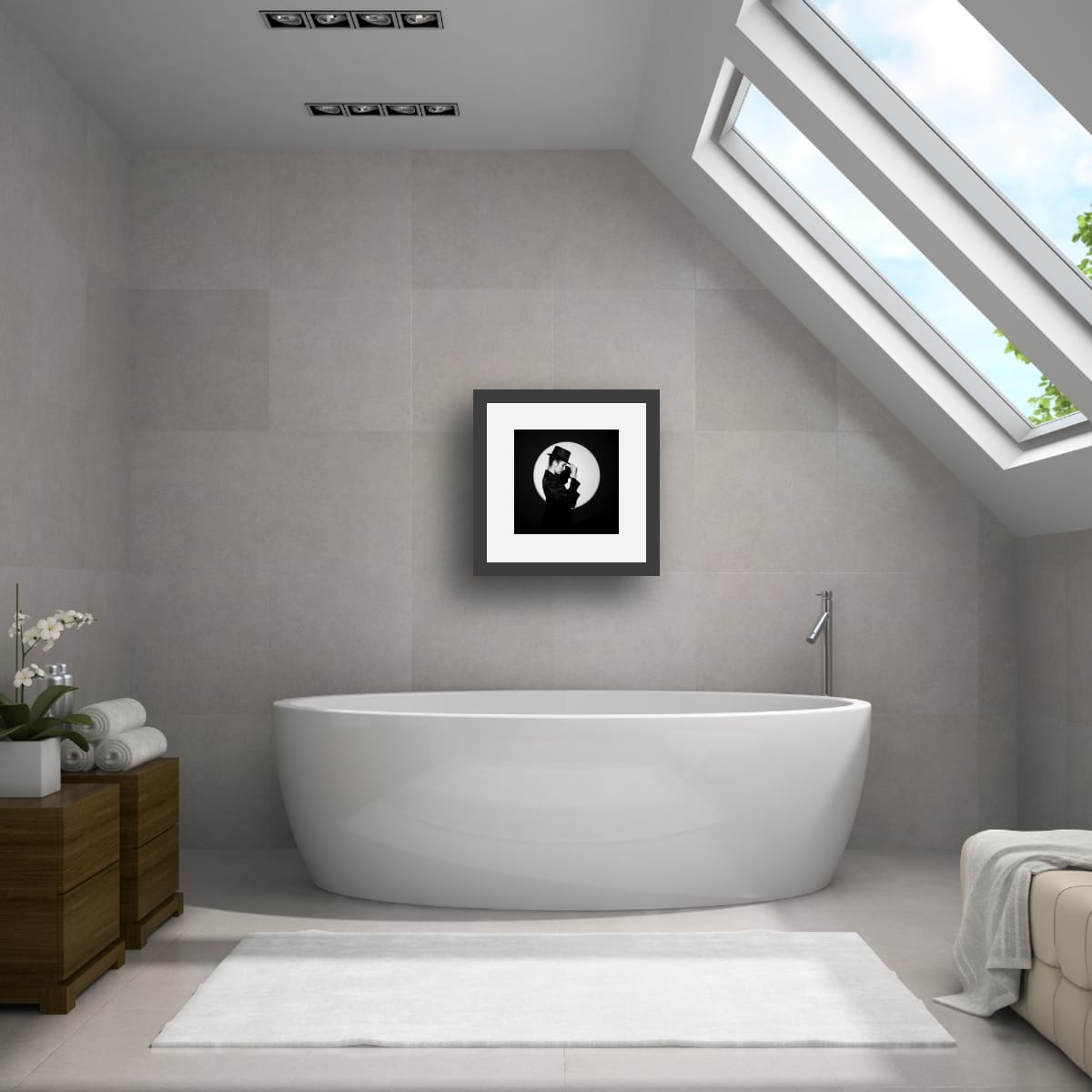 Modern bathroom with a freestanding bathtub, framed artwork 'In the Spotlight' on the wall.